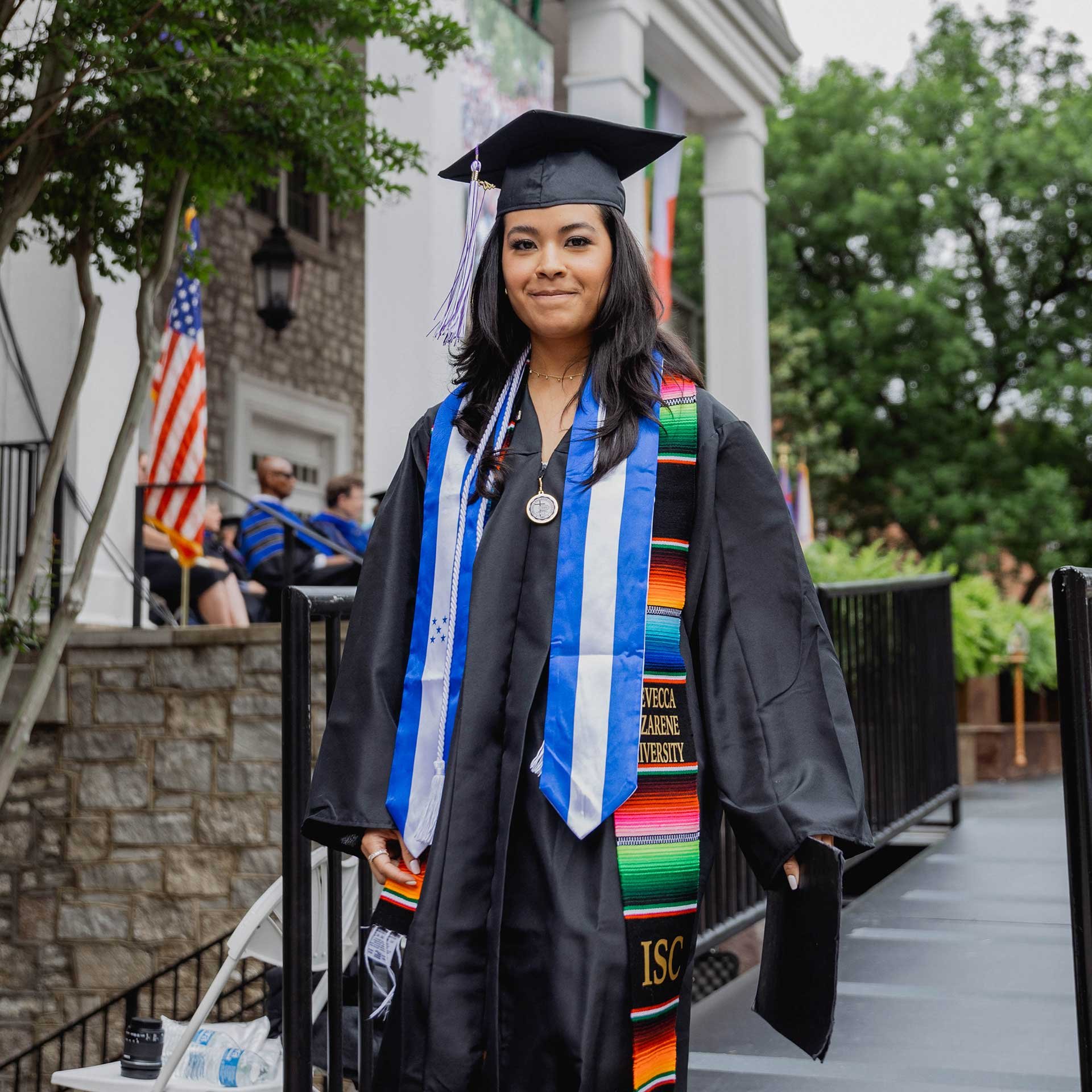 Claudia Nunez walks at graduation