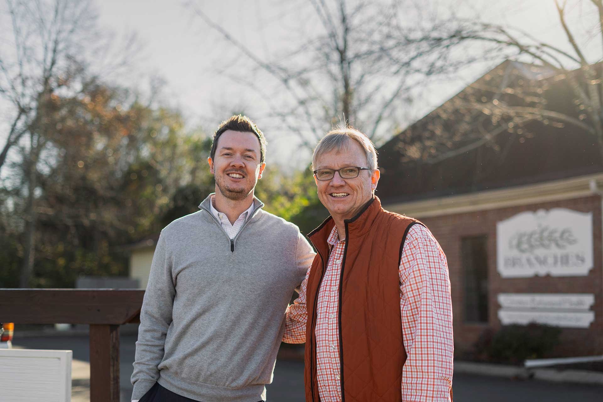 Mike and Josh Courtney pose in front of their counseling center.