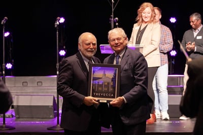 Charles Bone presented an award by President Dan Boone.