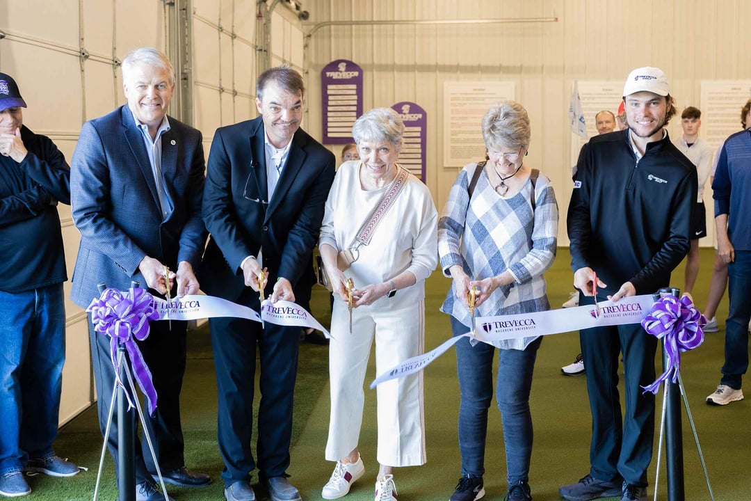 A ribbon is cut at the dedication for Trevecca's new golf facility.