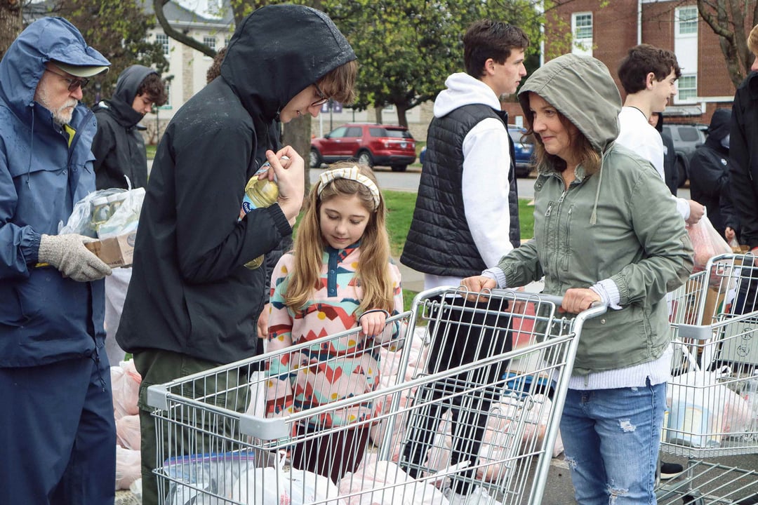 Trevecca's men's soccer team hands out food to the local community.